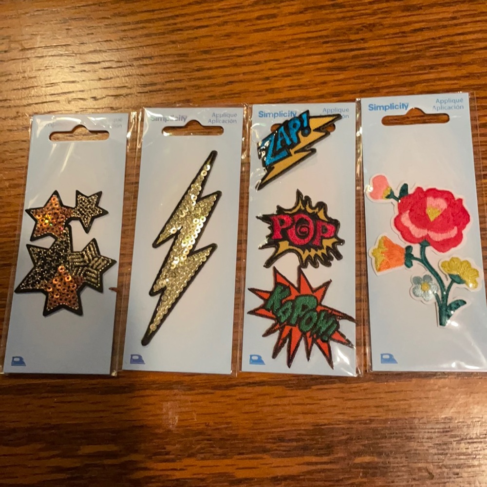 Four appliqué applications(iron on patches)